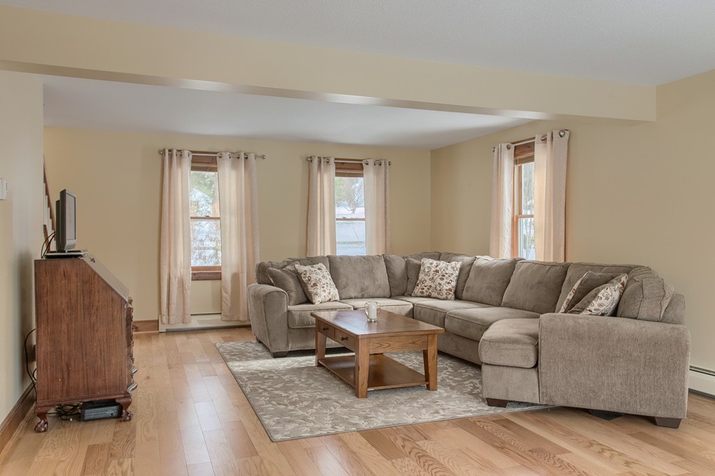 253 New Boston Road Sturbridge, MA 01566 - Photo 10 of 30 a living room with furniture and wooden floor