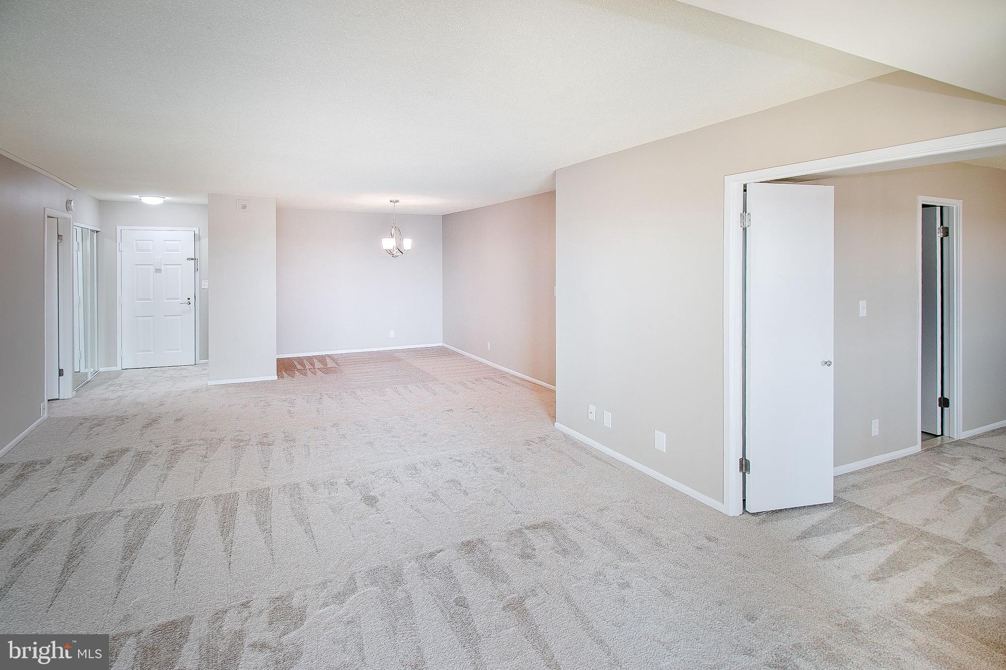 5901 Mt Eagle Drive, Unit 1101 Alexandria, VA 22303 - Photo 10 of 44 The fully carpeted DR is 10 x 10.