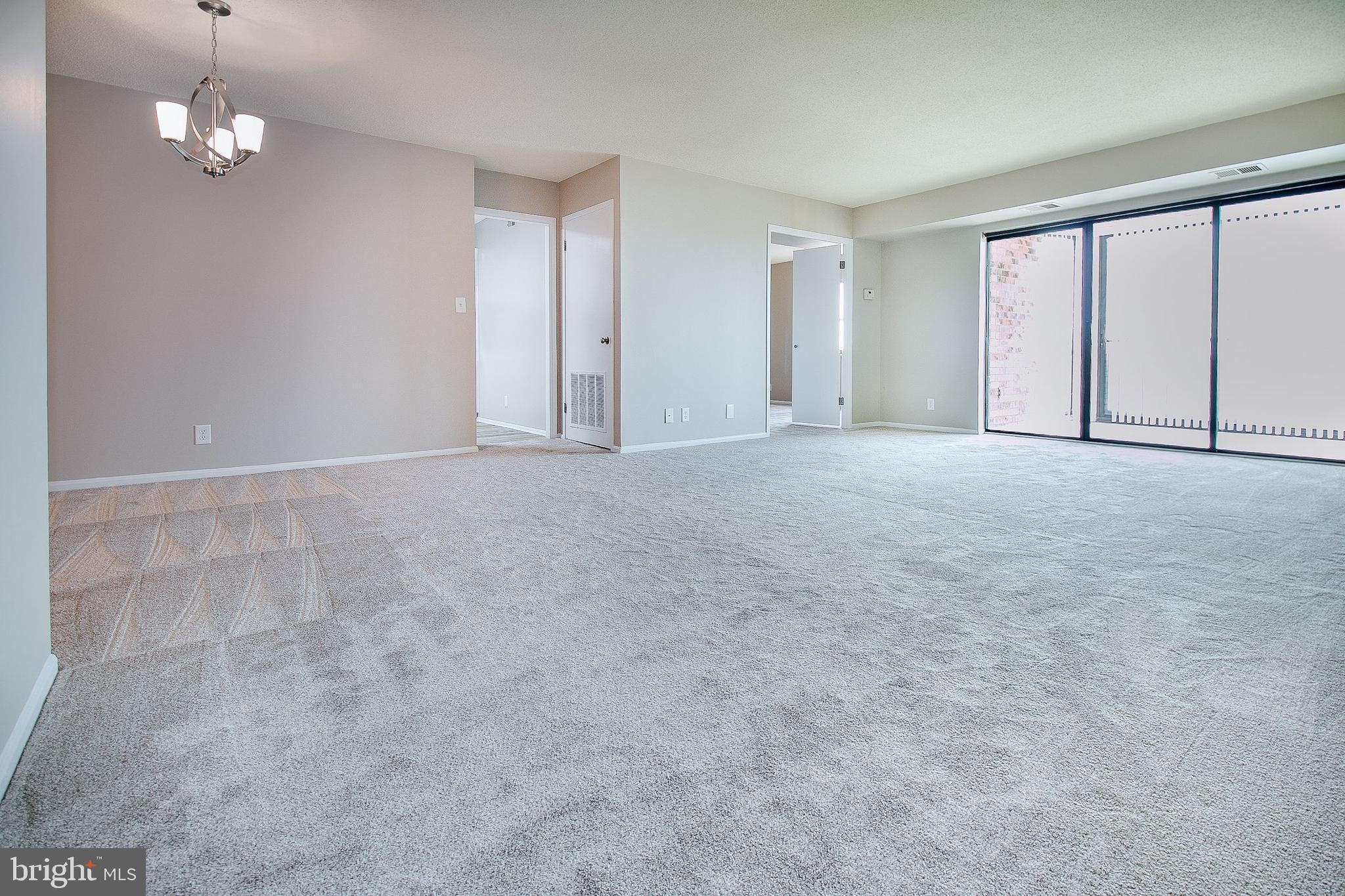 5901 Mt Eagle Drive, Unit 1101 Alexandria, VA 22303 - Photo 43 of 44 Open floor plan features new carpeting and paint.