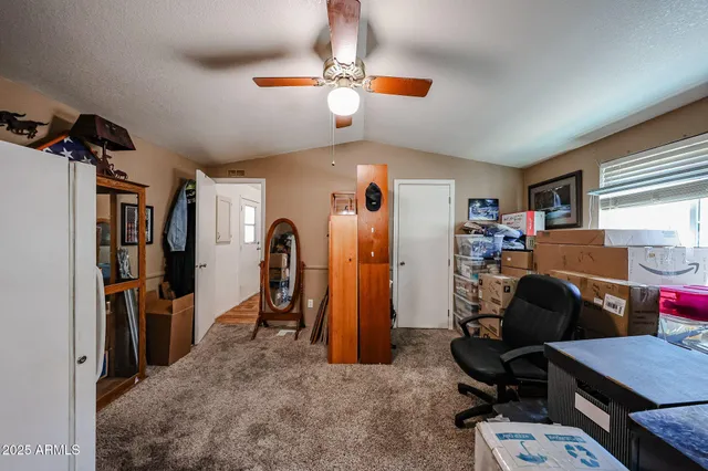 a room with furniture and gym equipment