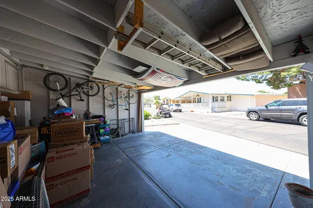 a view of living room with furniture and a garage