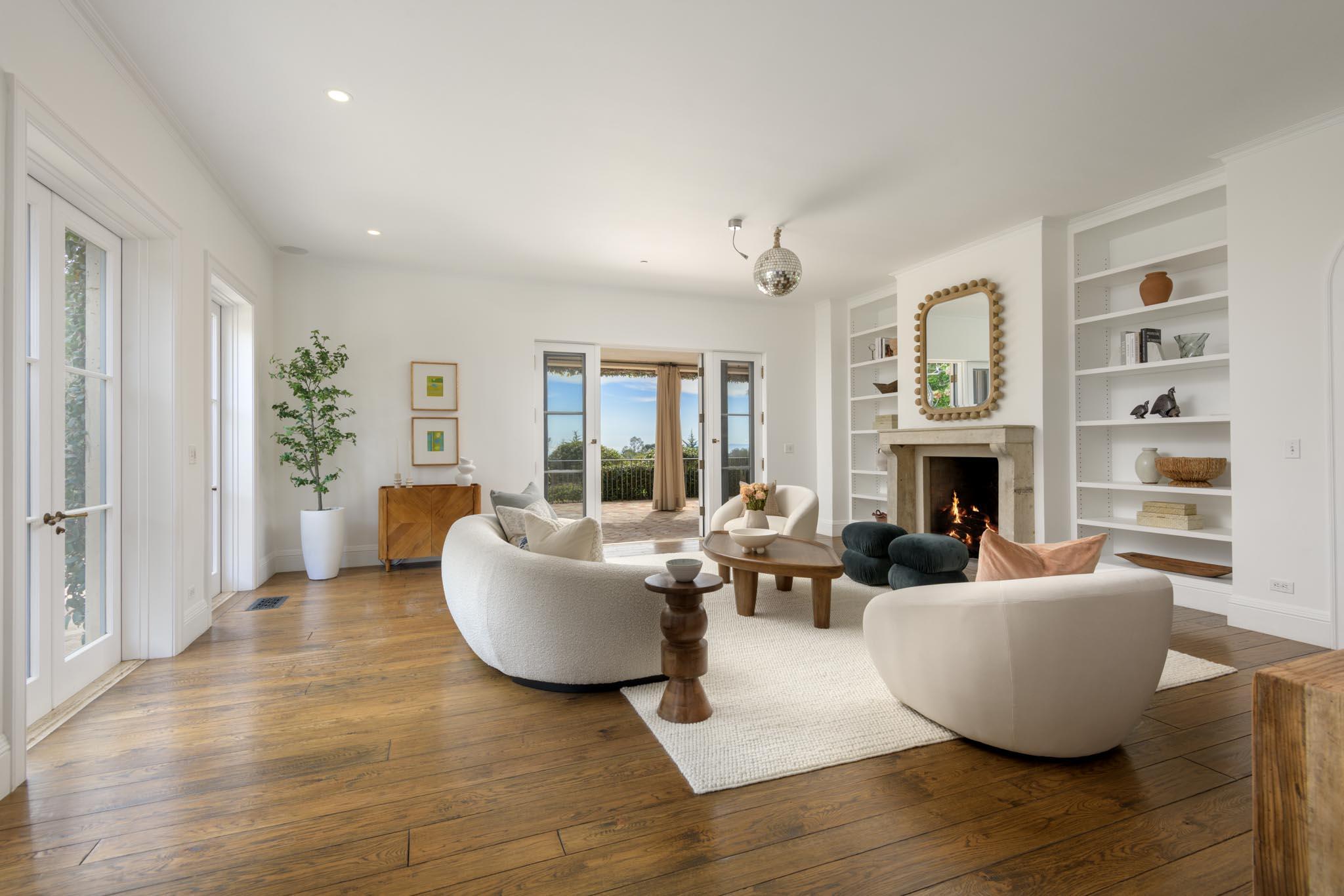 771 Garden Lane Montecito, CA 93108 - Photo 21 of 44 a living room with furniture and a fireplace