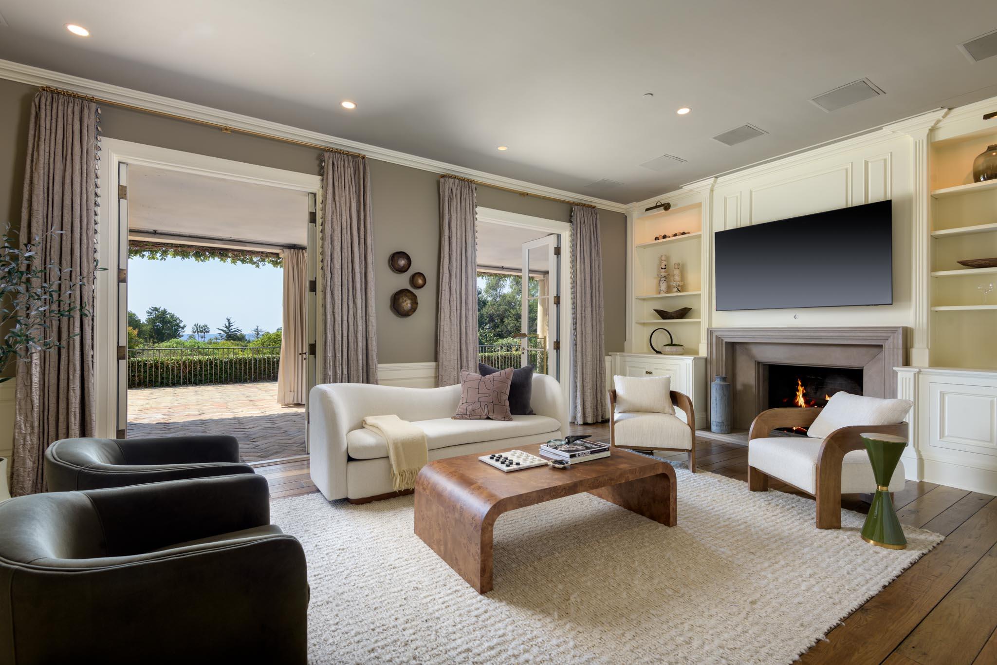 771 Garden Lane Montecito, CA 93108 - Photo 28 of 44 a living room with furniture and a fireplace