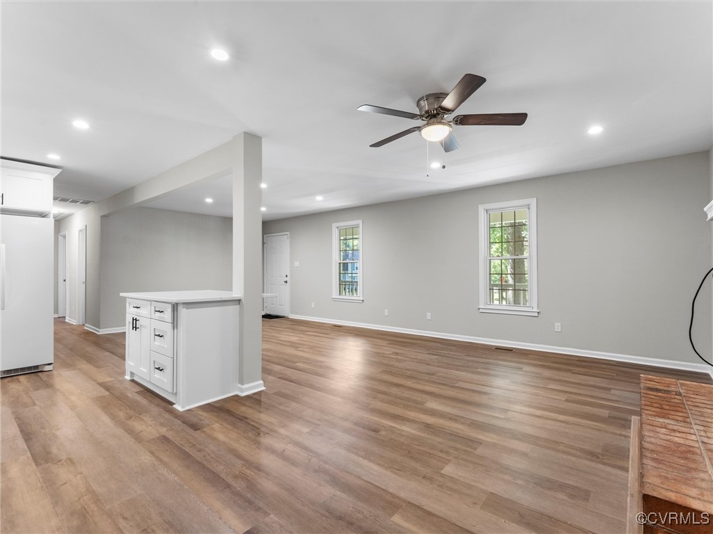 3918 Seamist Road Chester, VA 23831 - Photo 14 of 36 a view of an empty room with window and wooden floor
