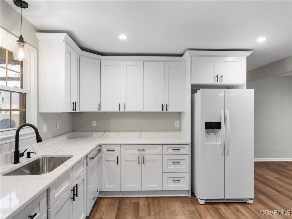 3918 Seamist Road Chester, VA 23831 - Photo 19 of 36 a kitchen with white cabinets and refrigerator