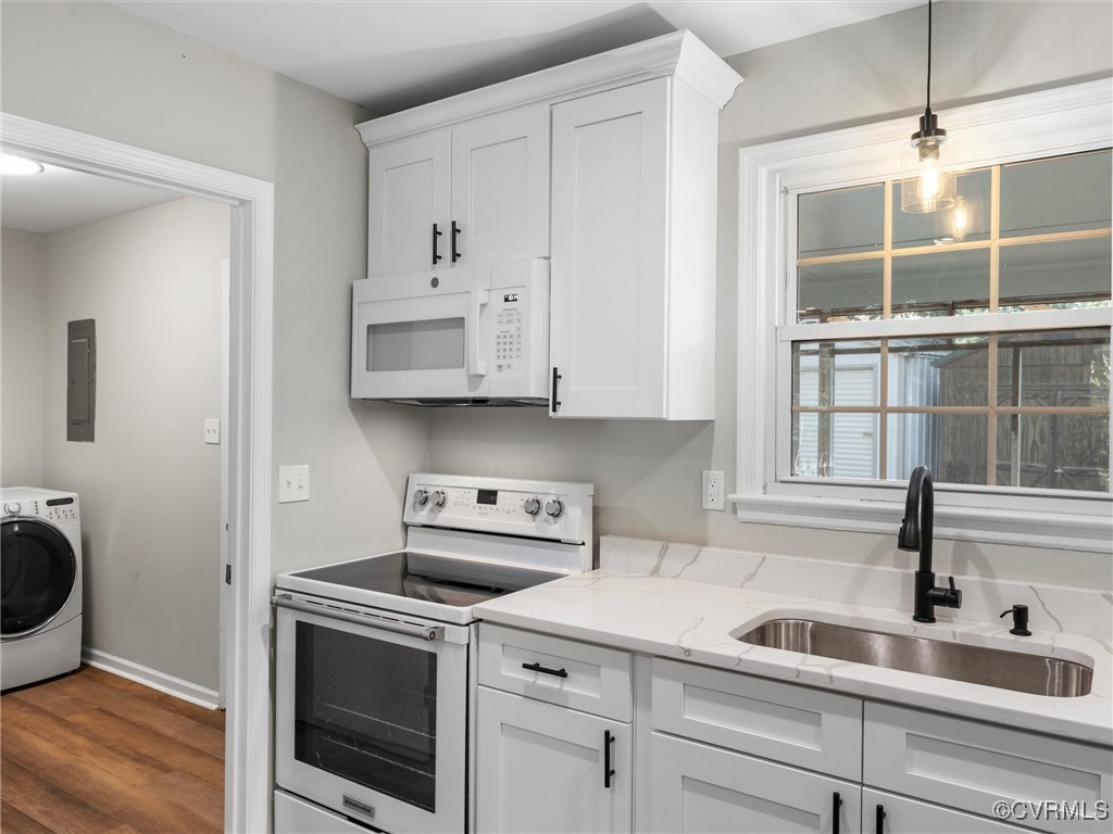 3918 Seamist Road Chester, VA 23831 - Photo 20 of 36 a kitchen with white cabinets and white appliances