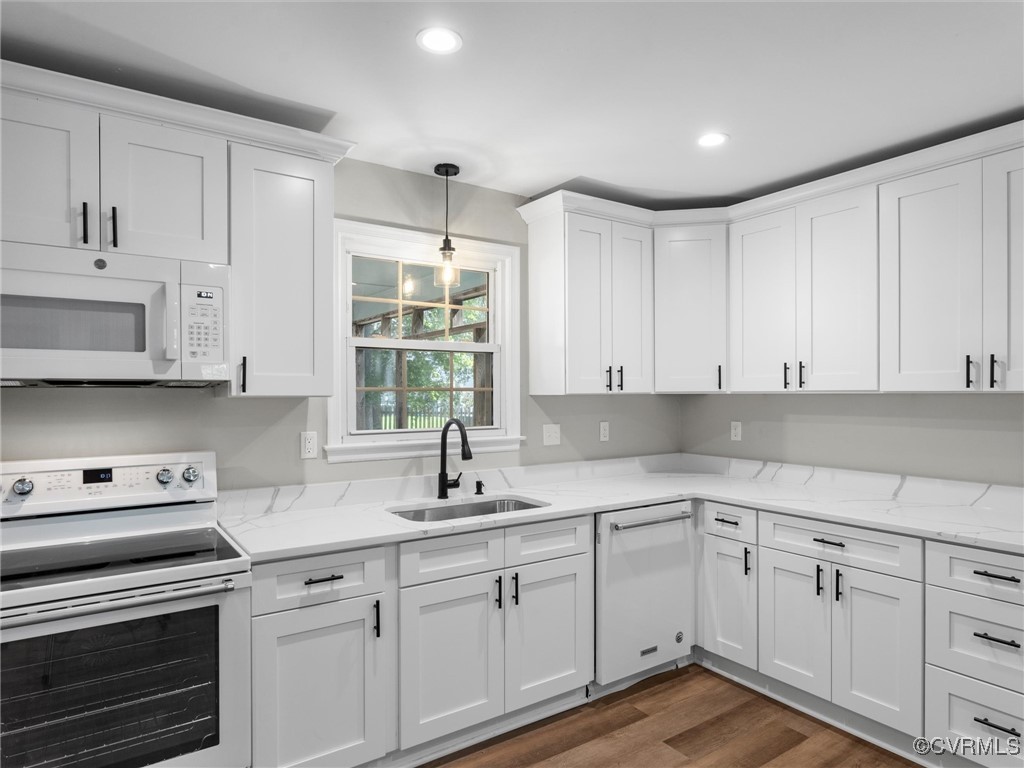3918 Seamist Road Chester, VA 23831 - Photo 21 of 36 a kitchen with cabinets appliances a sink and a window