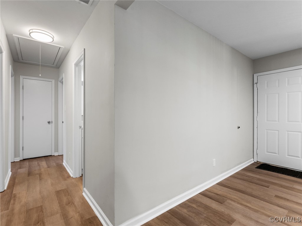 3918 Seamist Road Chester, VA 23831 - Photo 22 of 36 a view of a hallway with wooden floor