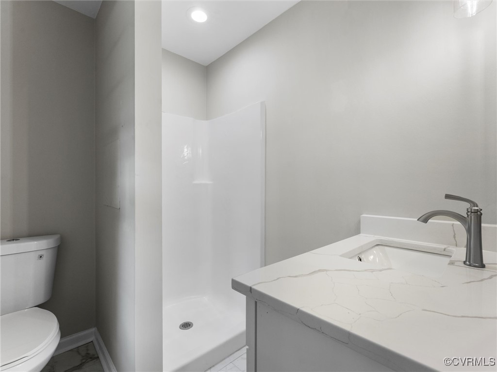3918 Seamist Road Chester, VA 23831 - Photo 27 of 36 a bathroom with a sink and a toilet