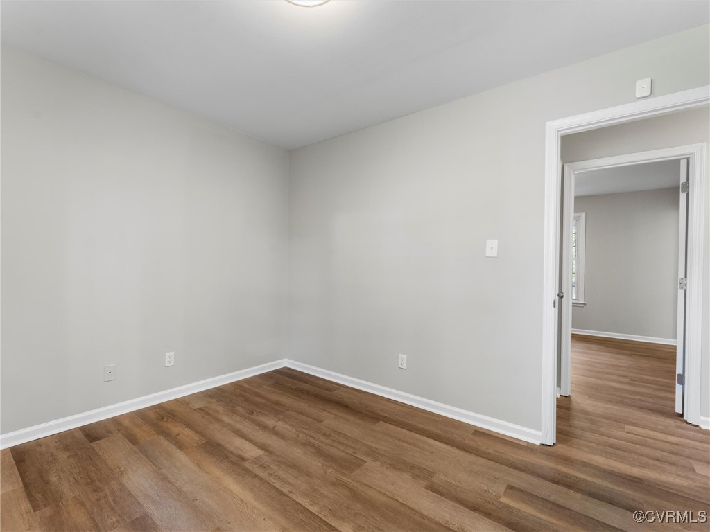 3918 Seamist Road Chester, VA 23831 - Photo 29 of 36 a view of an empty room with wooden floor and closet