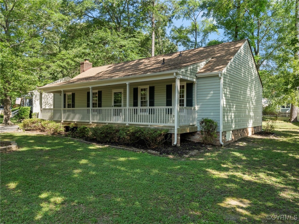 3918 Seamist Road Chester, VA 23831 - Photo 3 of 36 a view of a house with a yard chairs and large tree