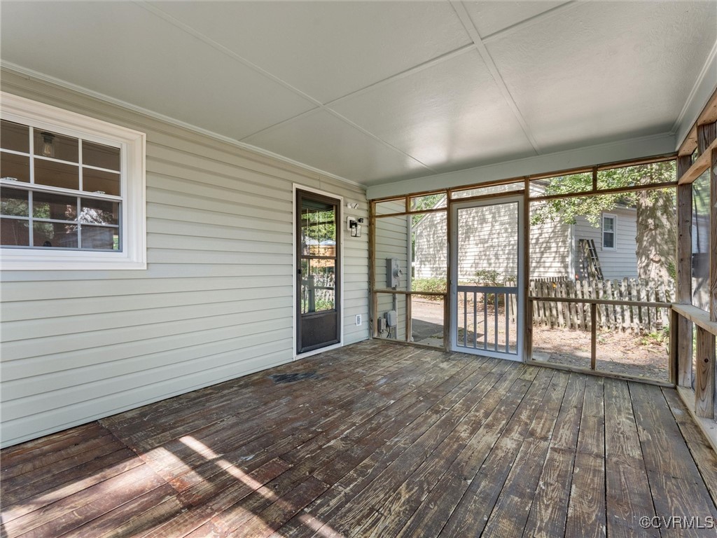 3918 Seamist Road Chester, VA 23831 - Photo 35 of 36 a view of an empty room with wooden floor and a window