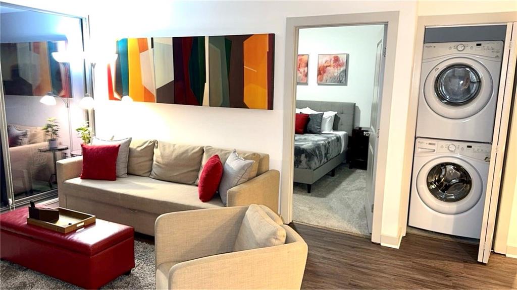 3382 Peachtree Road Northeast, Unit S12 Atlanta, GA 30326 - Photo 5 of 29 a living room with furniture and a couch