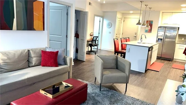 a living room with furniture and a table