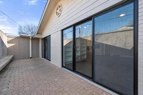 a view of a glass door of the house