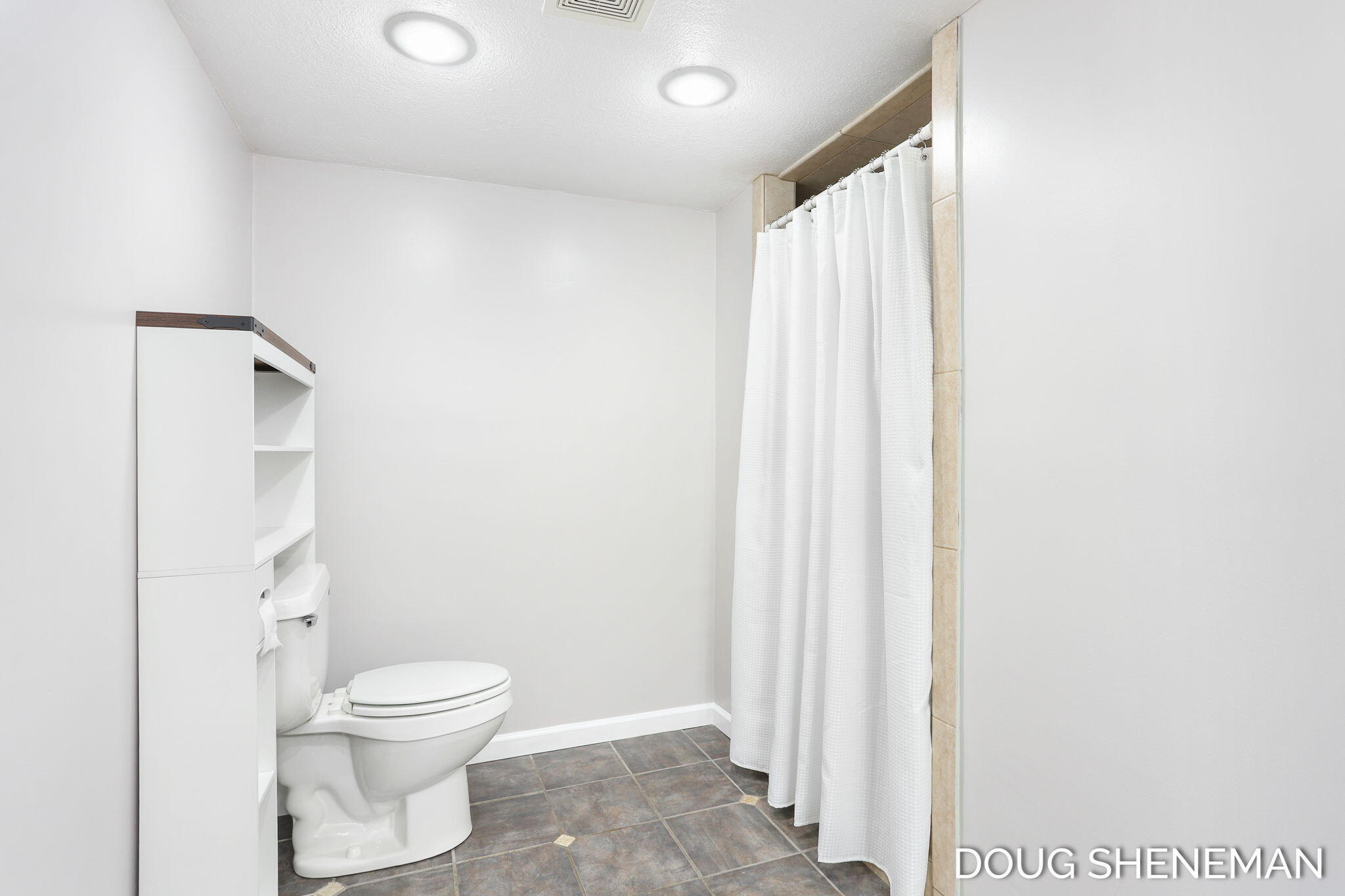 138 Riley Street Holland, MI 49424 - Photo 25 of 41 Primary Bathroom with Tiled Shower