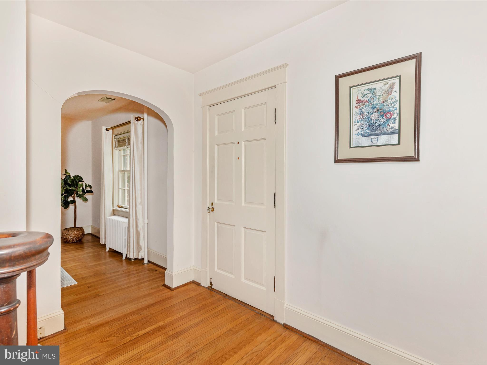 640 Wilson Place Frederick, MD 21702 - Photo 31 of 43 a view of a hallway with wooden floor and furniture