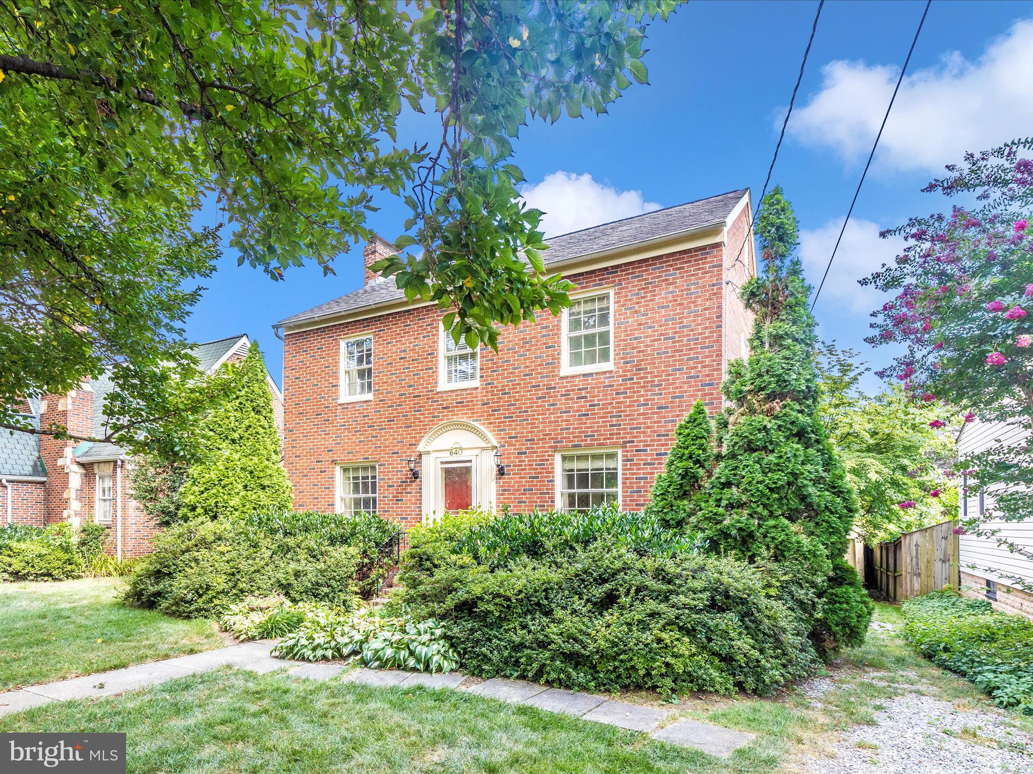 640 Wilson Place Frederick, MD 21702 - Photo 32 of 43 a front view of a house with garden