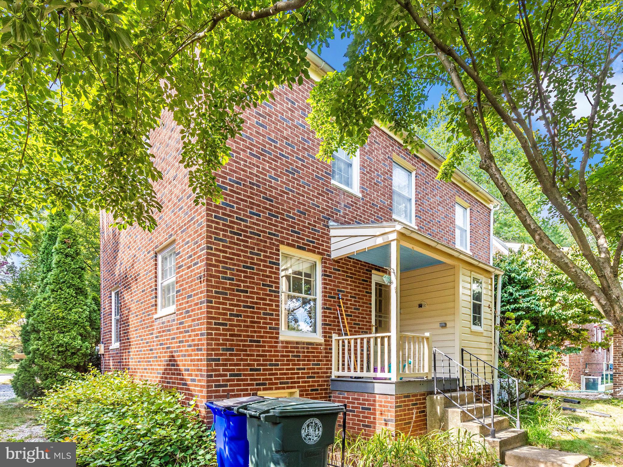640 Wilson Place Frederick, MD 21702 - Photo 41 of 43 a front view of a house with a yard