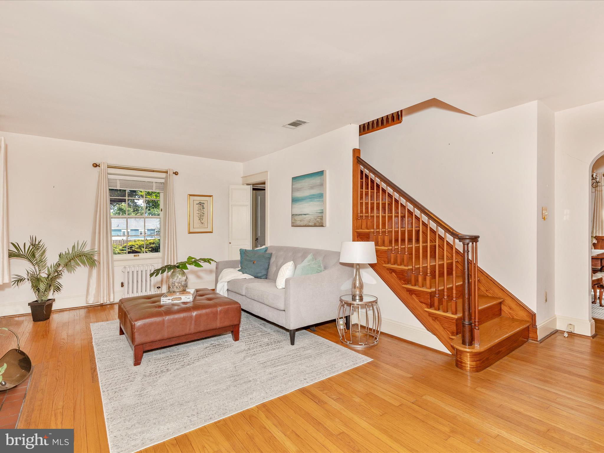 640 Wilson Place Frederick, MD 21702 - Photo 5 of 43 a living room with furniture and a wooden floor