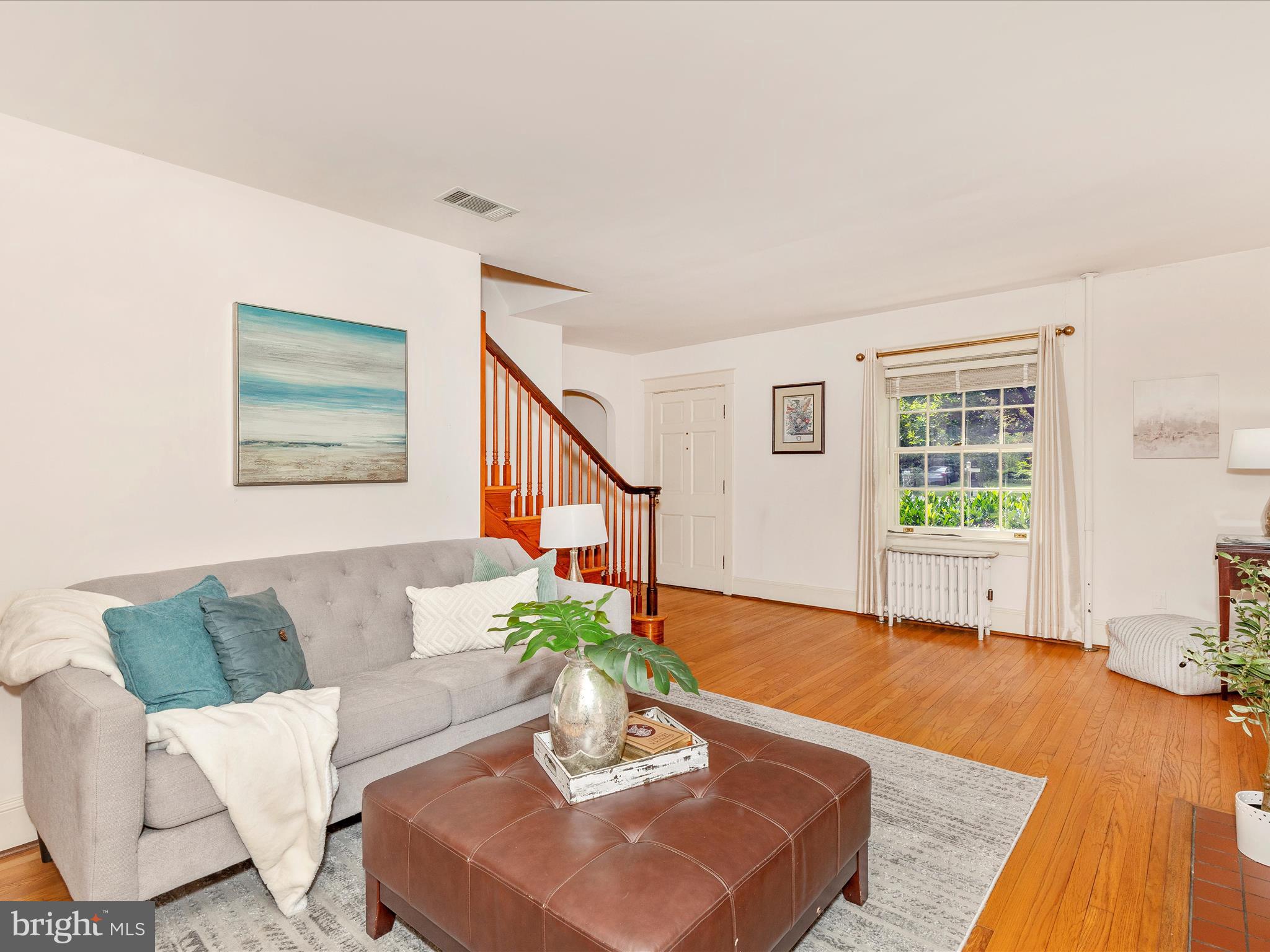 640 Wilson Place Frederick, MD 21702 - Photo 7 of 43 a living room with furniture and a wooden floor