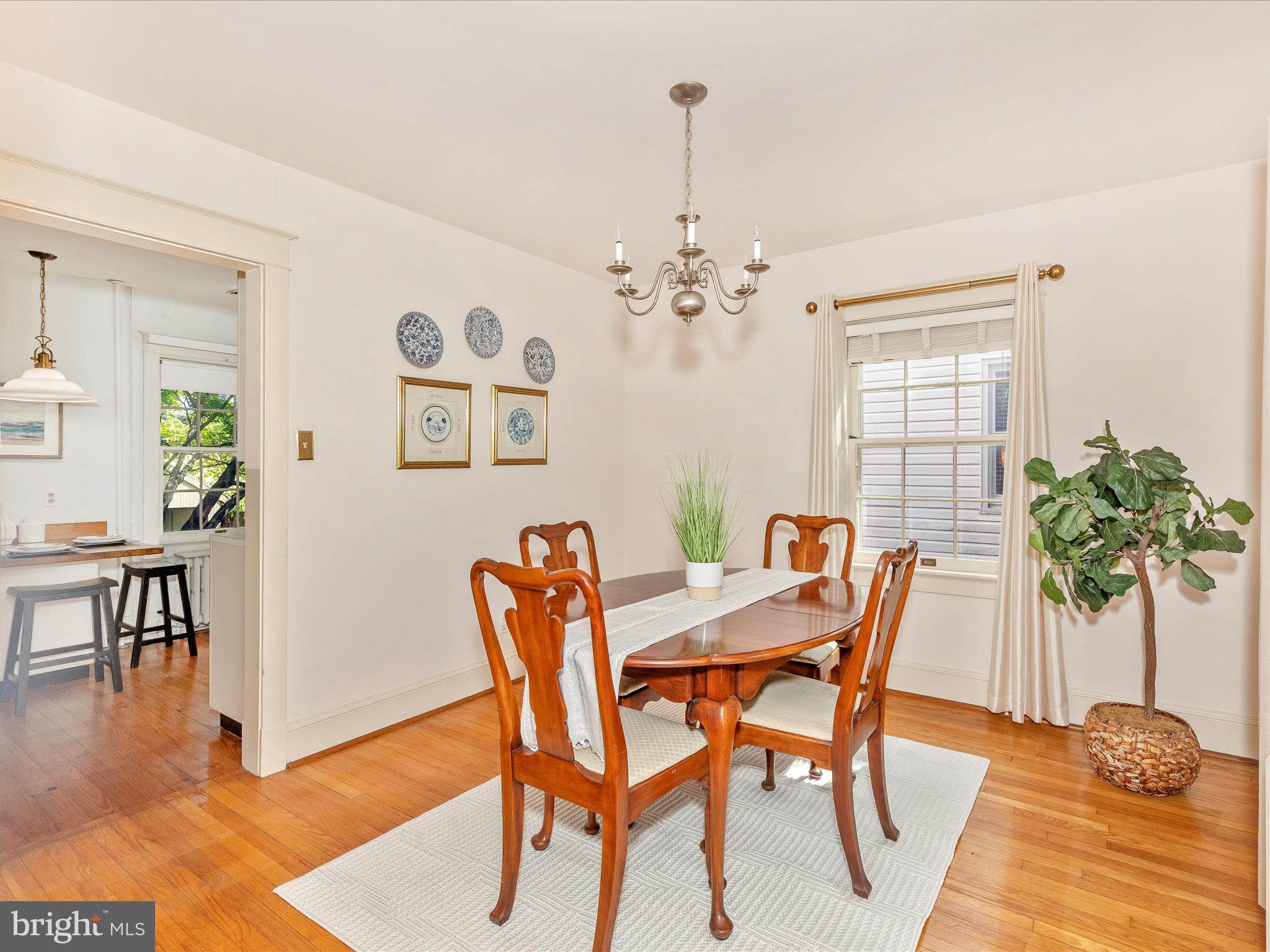 640 Wilson Place Frederick, MD 21702 - Photo 8 of 43 a view of a dining room with furniture and wooden floor