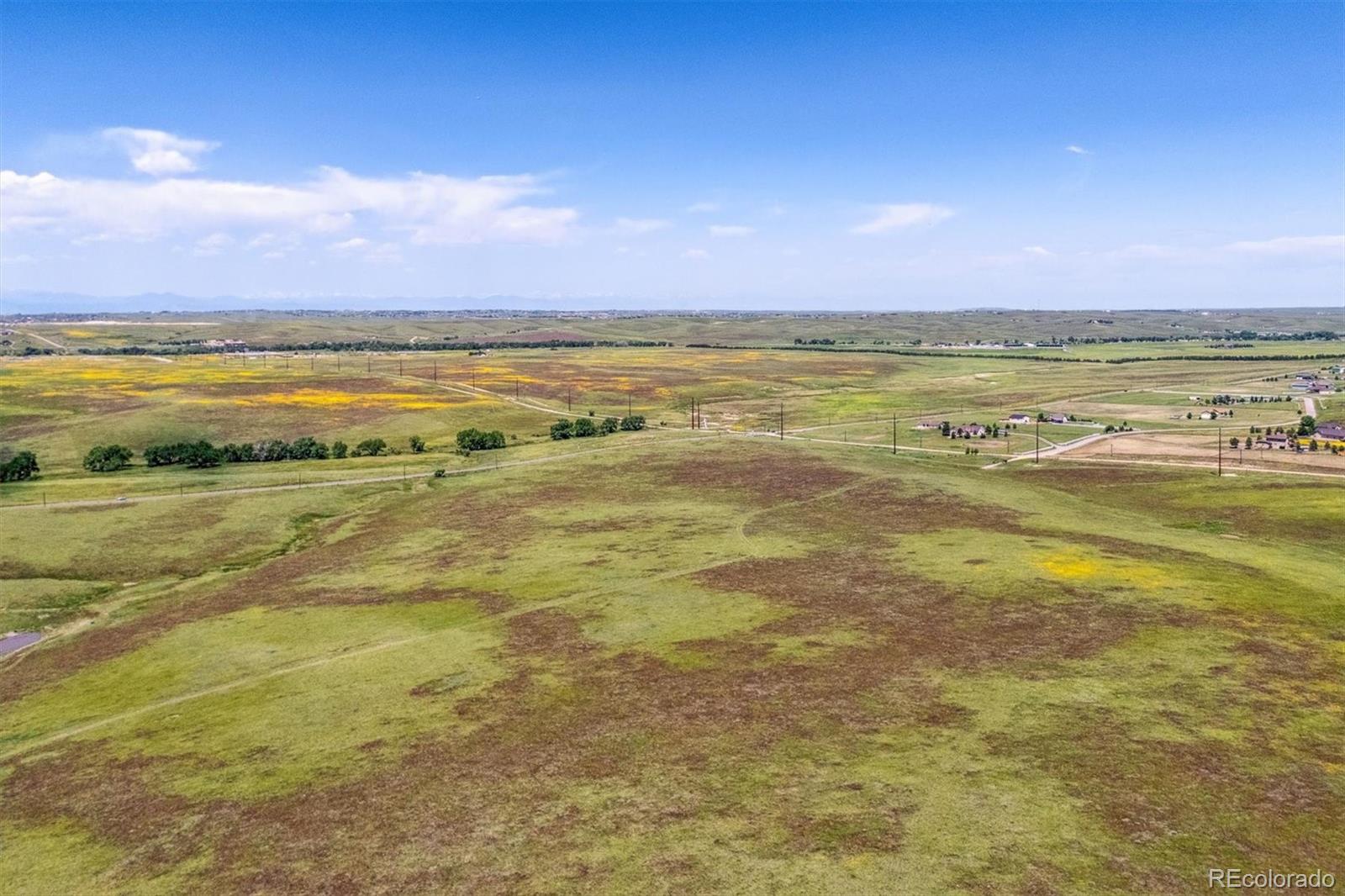 3 County Road 29 Elizabeth, CO 80107 - Photo 2 of 7 a view of an ocean and beach