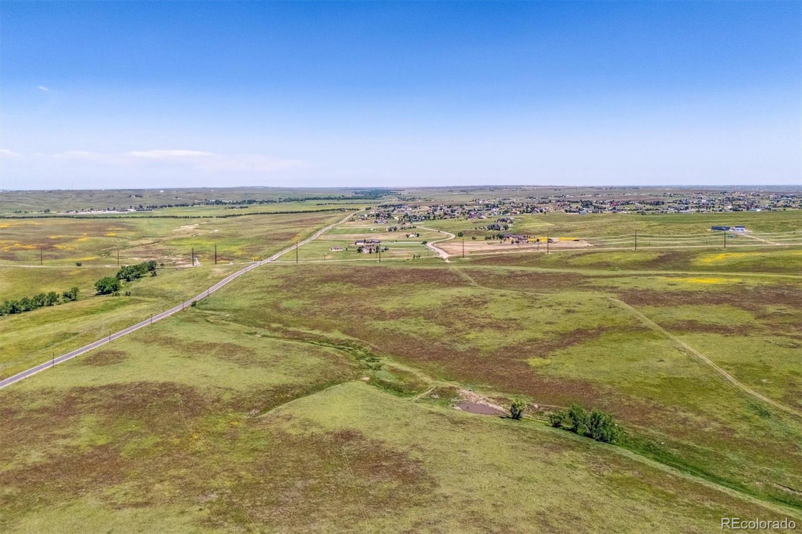 3 County Road 29 Elizabeth, CO 80107 - Photo 3 of 7 a view of an ocean and beach