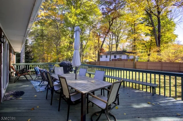 a view of a wooden chairs and table on the wooden floor