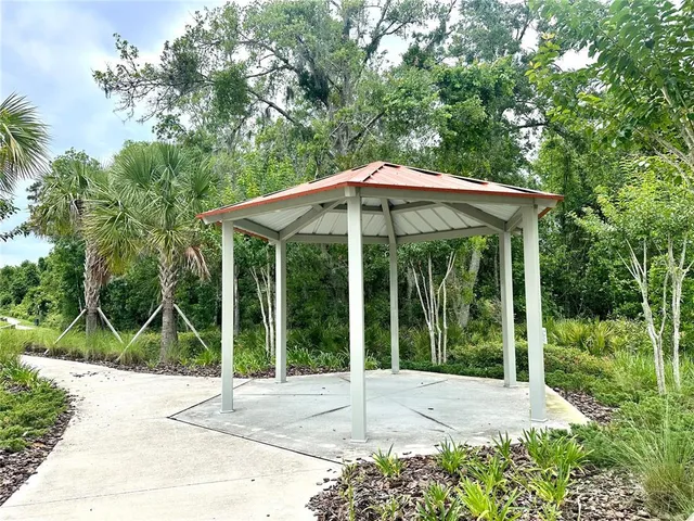 a view of park with sign board
