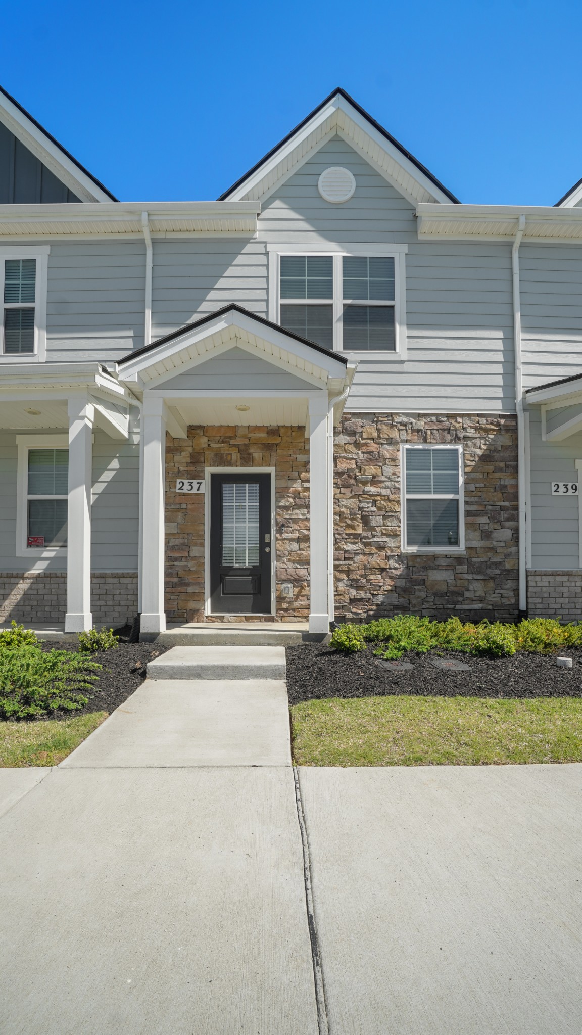 237 Catherine Lane Lebanon, TN 37087 - Photo 2 of 27 a front view of a house with a yard