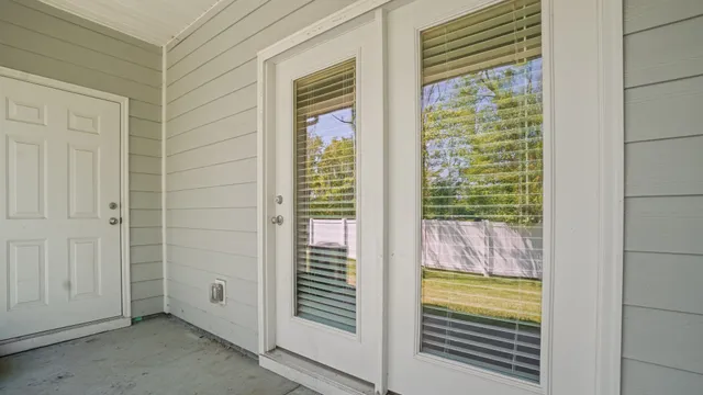 a view of a door and outdoor space