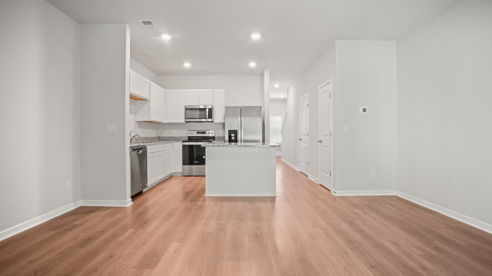 237 Catherine Lane Lebanon, TN 37087 - Photo 10 of 27 a view of kitchen with wooden floor and electronic appliances