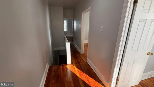 a view of hallway with stairs