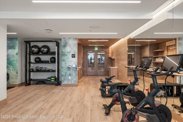 a very nice looking room with gym equipment