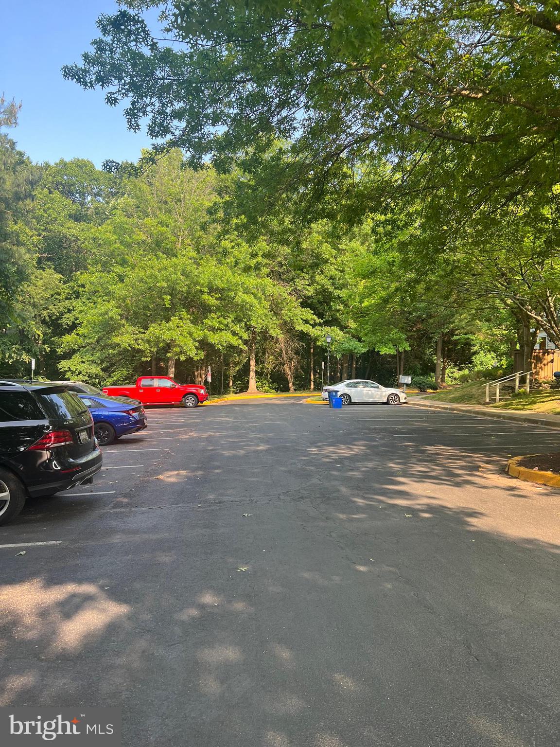 19086 Highstream Drive, Unit 766 Germantown, MD 20874 - Photo 20 of 21 a view of street with parked cars