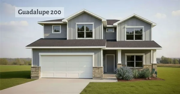a front view of a house with a garden and plants