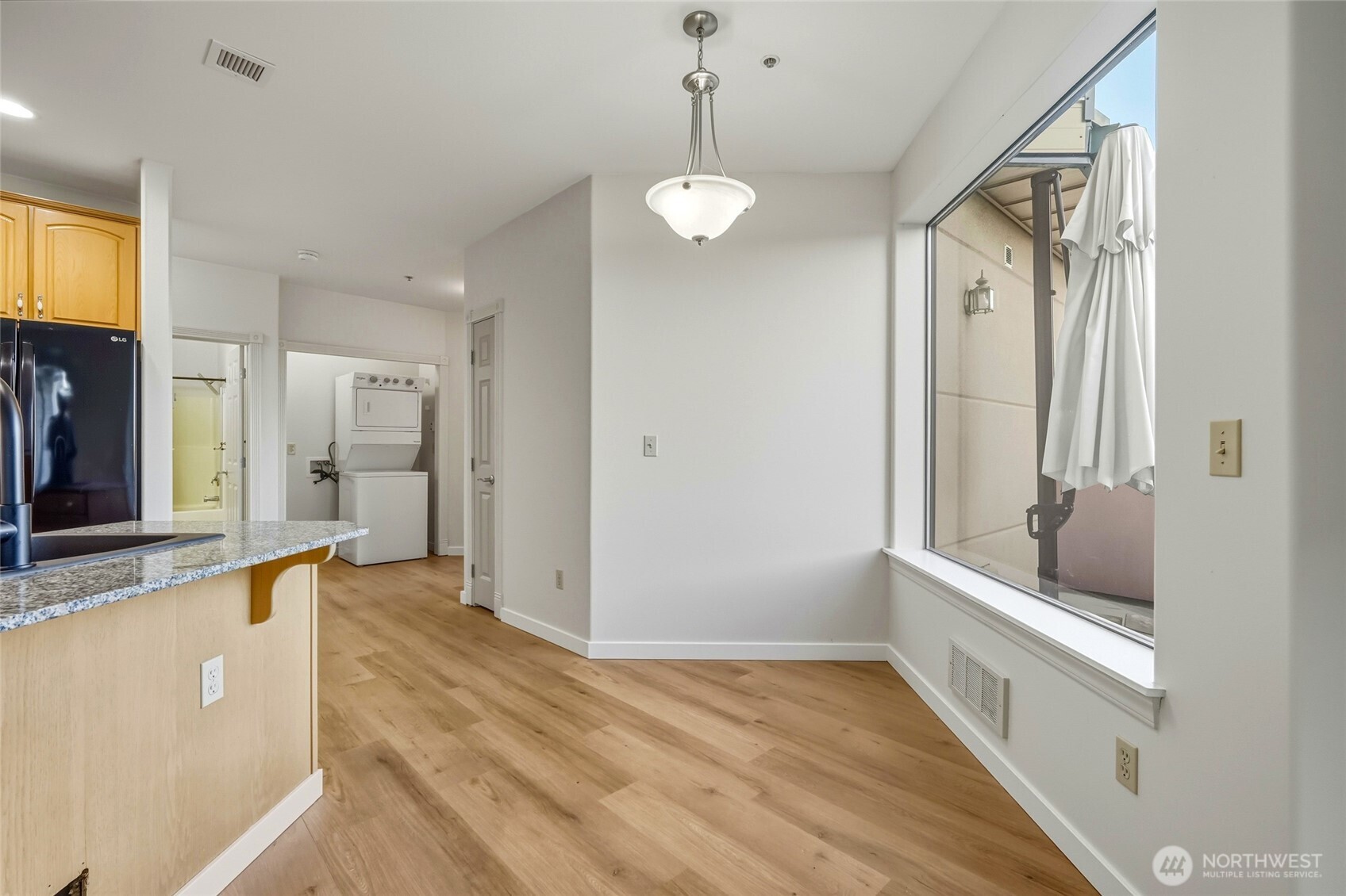 3501 Colby Avenue, Unit 311 Everett, WA 98201 - Photo 12 of 28 a bathroom with a tub shower and sink