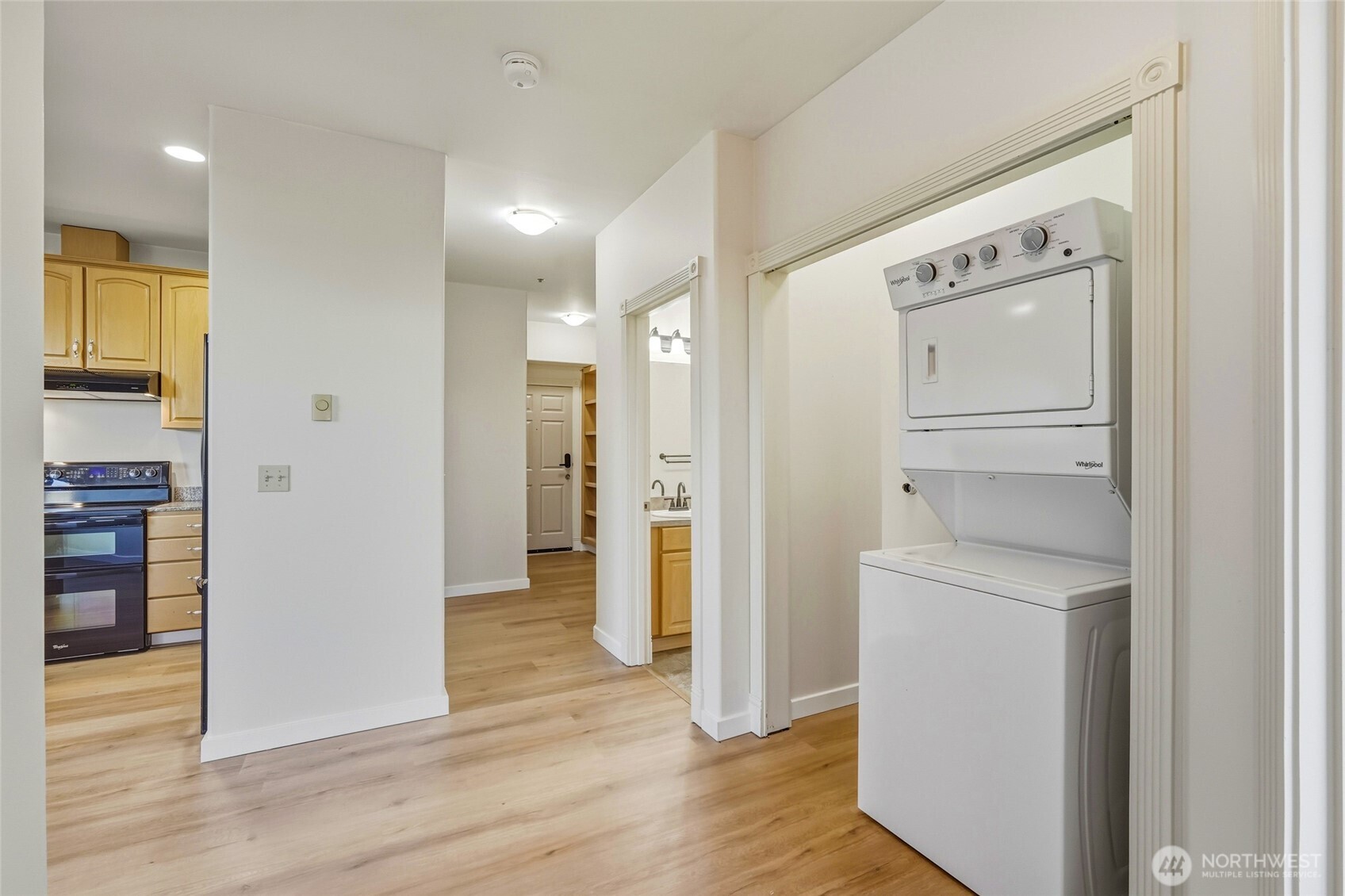 3501 Colby Avenue, Unit 311 Everett, WA 98201 - Photo 13 of 28 a view of walk in closet with wooden floor