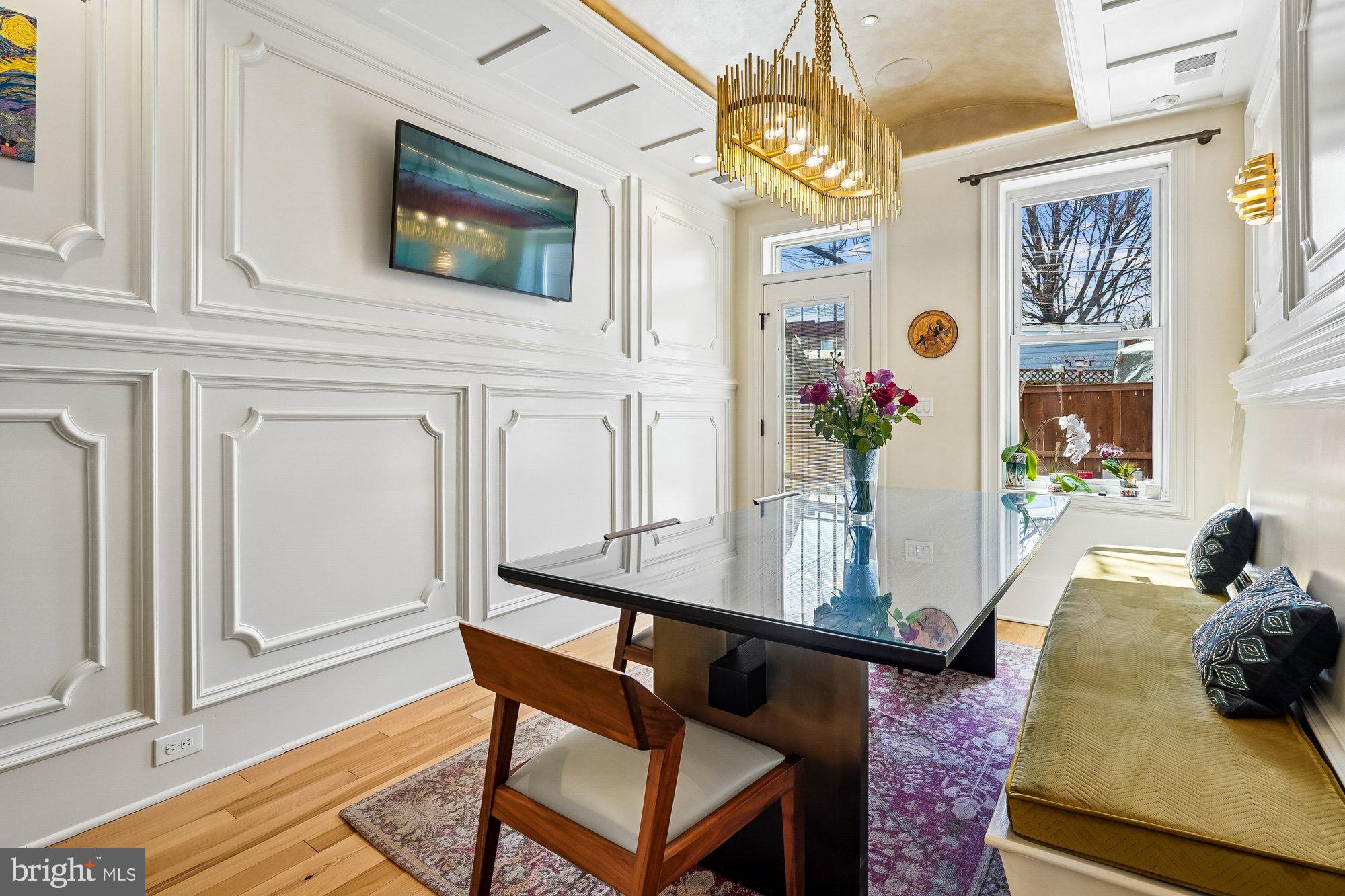 909 C Street Northeast Washington, DC 20002 - Photo 16 of 43 a view of a dining room with furniture and chandelier
