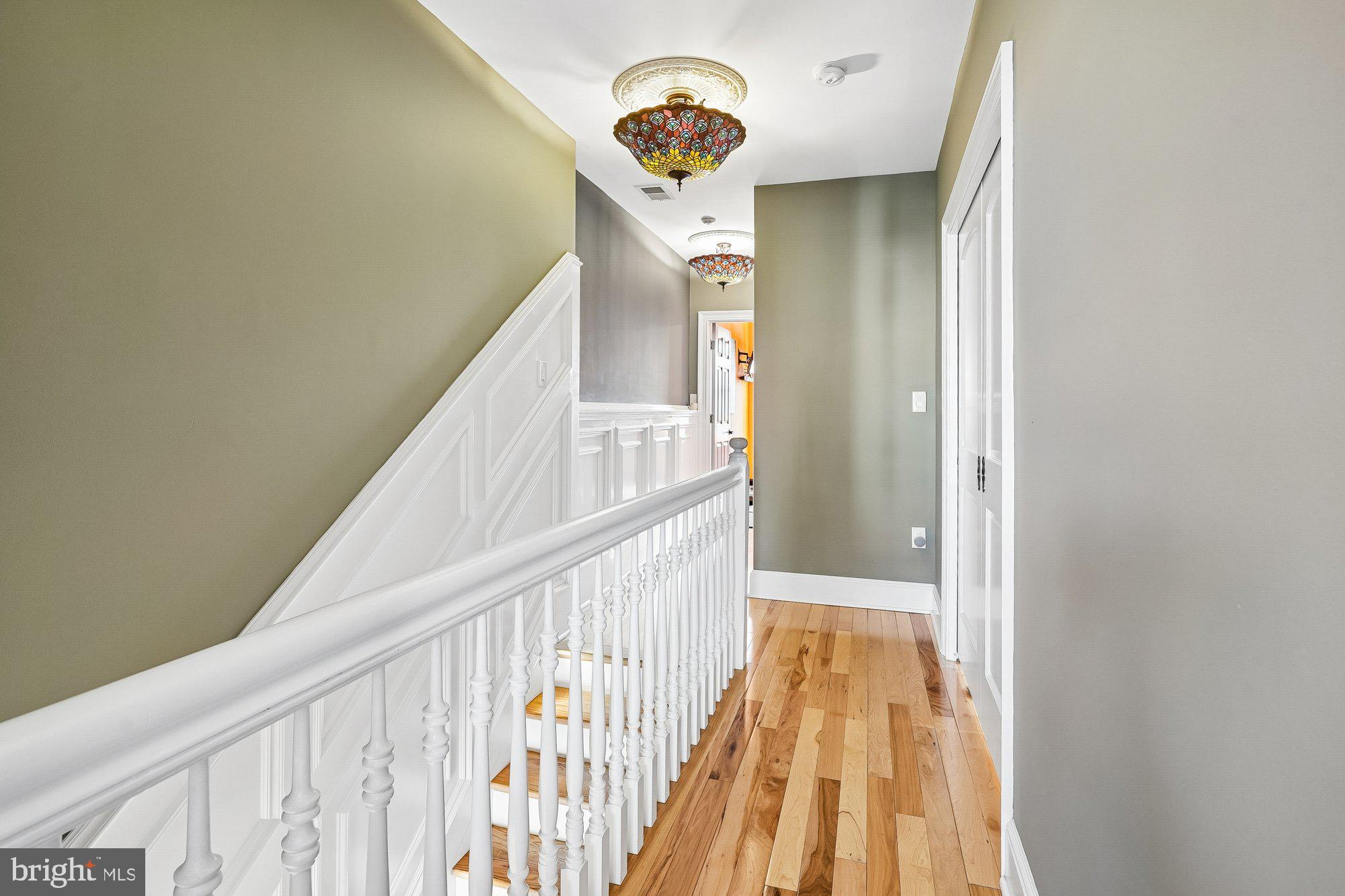 909 C Street Northeast Washington, DC 20002 - Photo 29 of 43 a view of staircase with railing and white walls