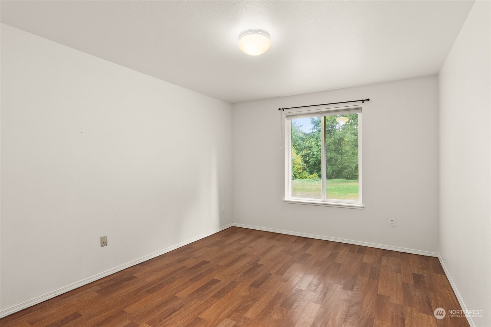 198 Valley Ridge Road Chehalis, WA 98532 - Photo 30 of 35 an empty room with wooden floor and windows