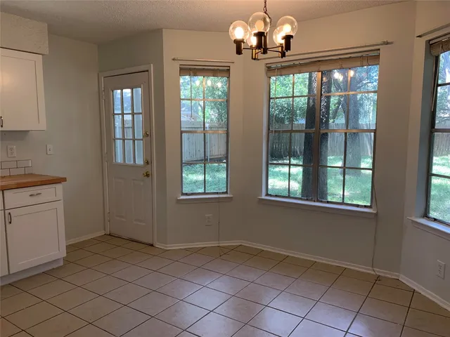 a view of an empty room with window