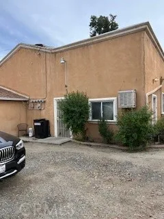a view of a house with a yard and garage