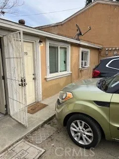 a car parked in front of a house