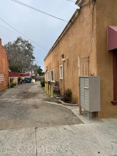 a view of a street with cars