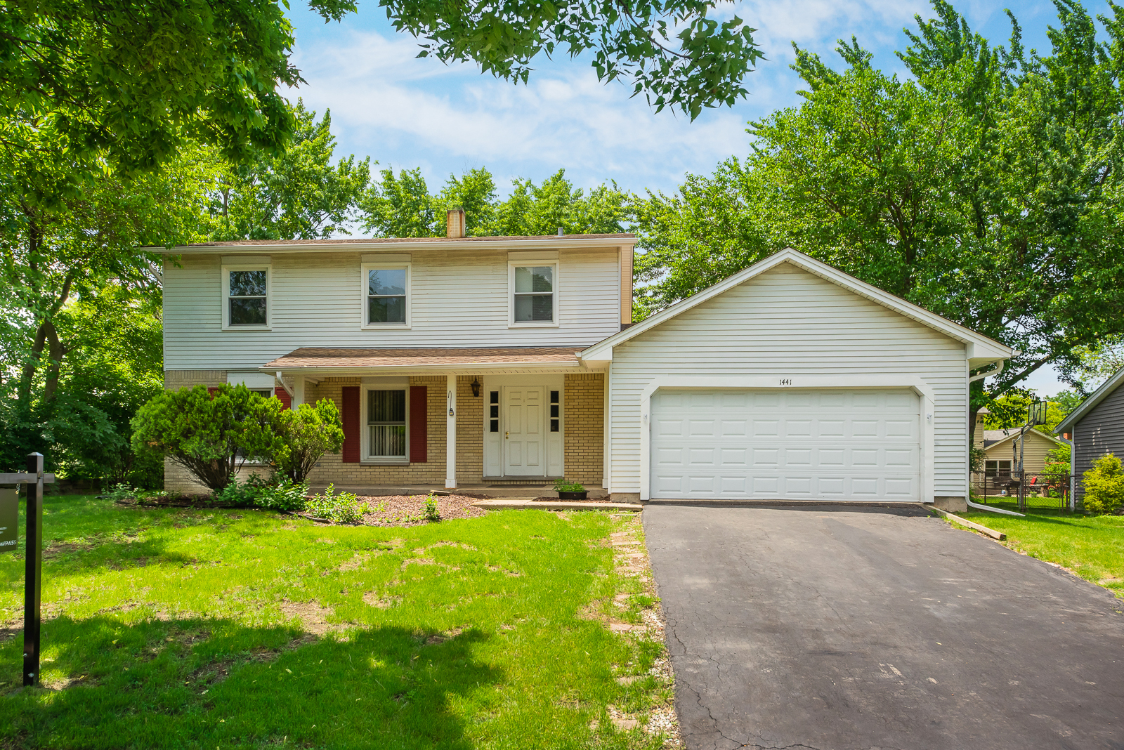 1441 Concord Drive Downers Grove, IL 60516 - Photo 1 of 16 a front view of house with yard and green space
