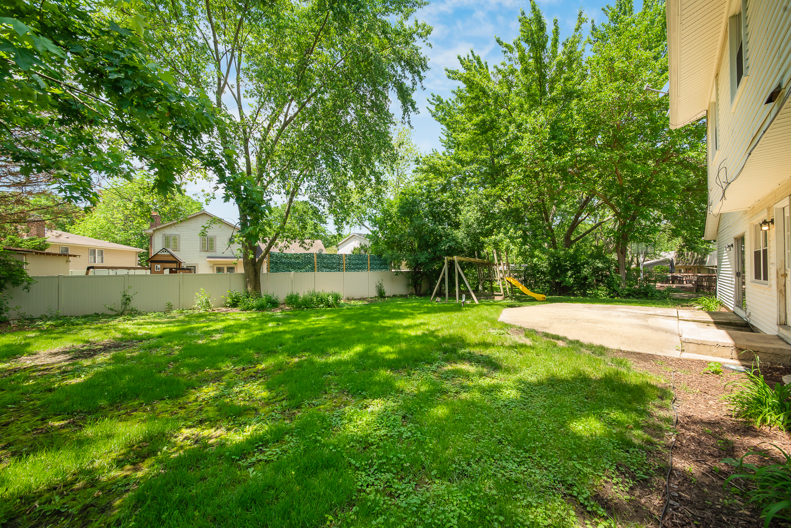 1441 Concord Drive Downers Grove, IL 60516 - Photo 16 of 16 a view of a backyard with a tree