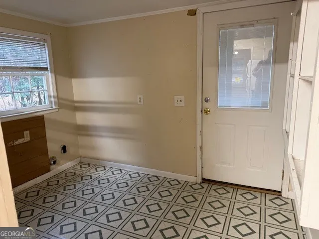 an empty room with windows