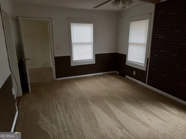 a view of a kitchen with a sink